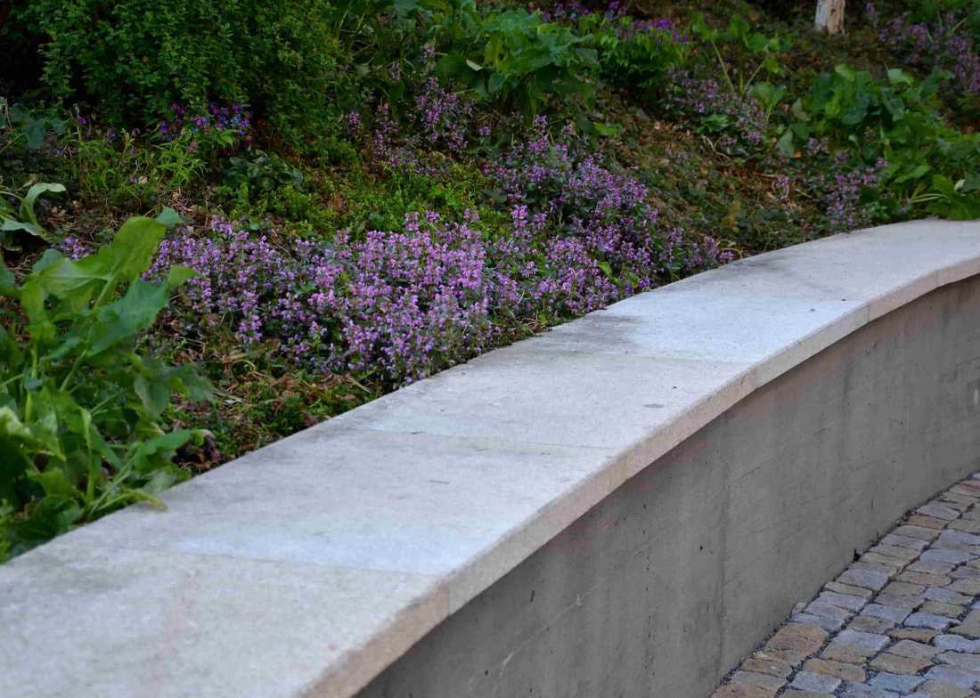 This concrete retaining wall was installed for the city of Surrey to keep the soil in place at a local park.